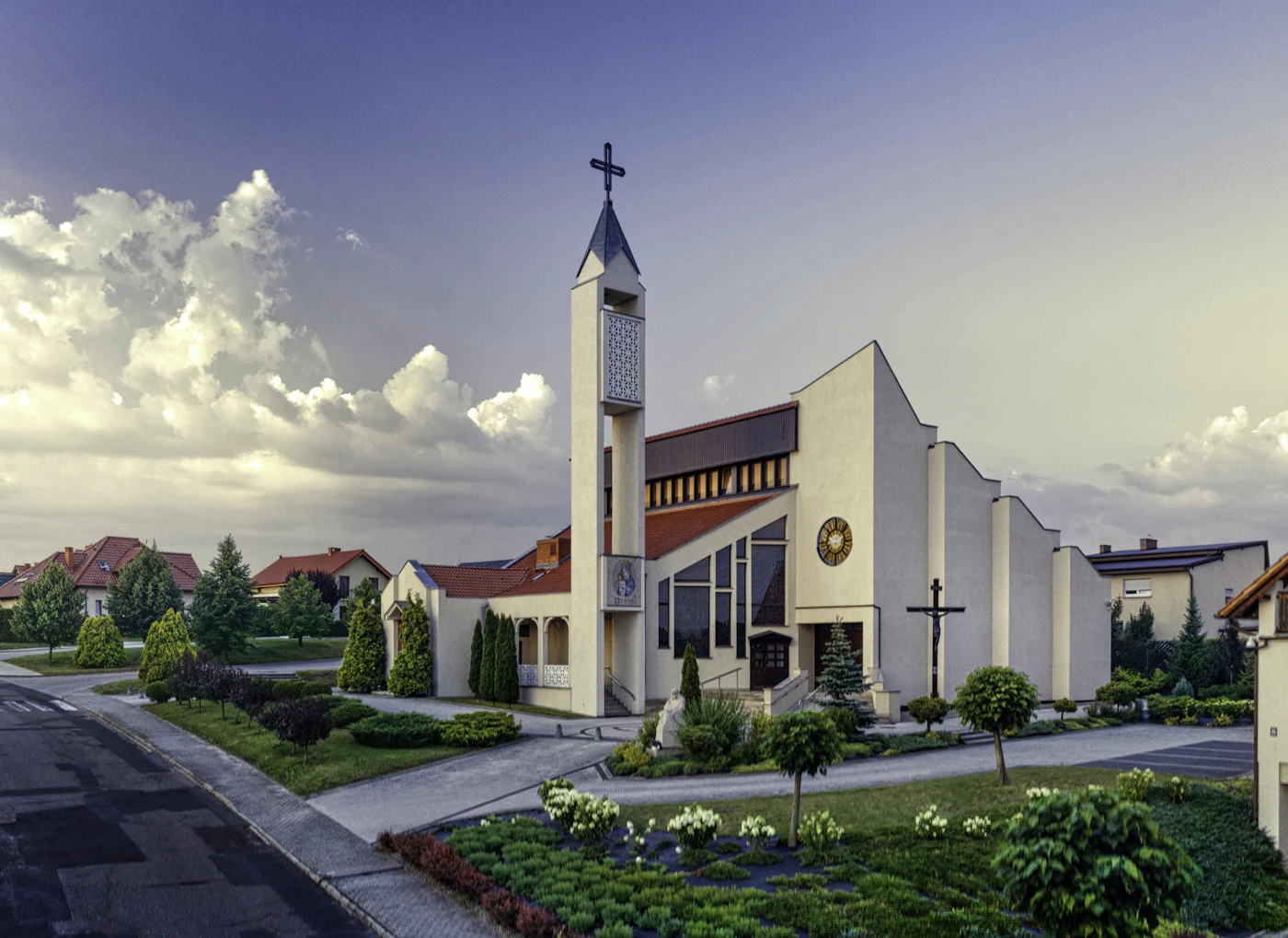 White church and steeple beneath a bright sky